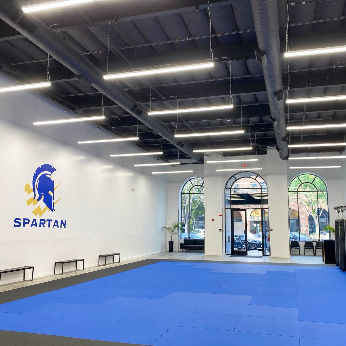 Inside Spartan Combat Sports: open mats, heavy bags and natural light